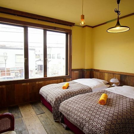 Hakuba Station Guesthouse En Exterior photo
