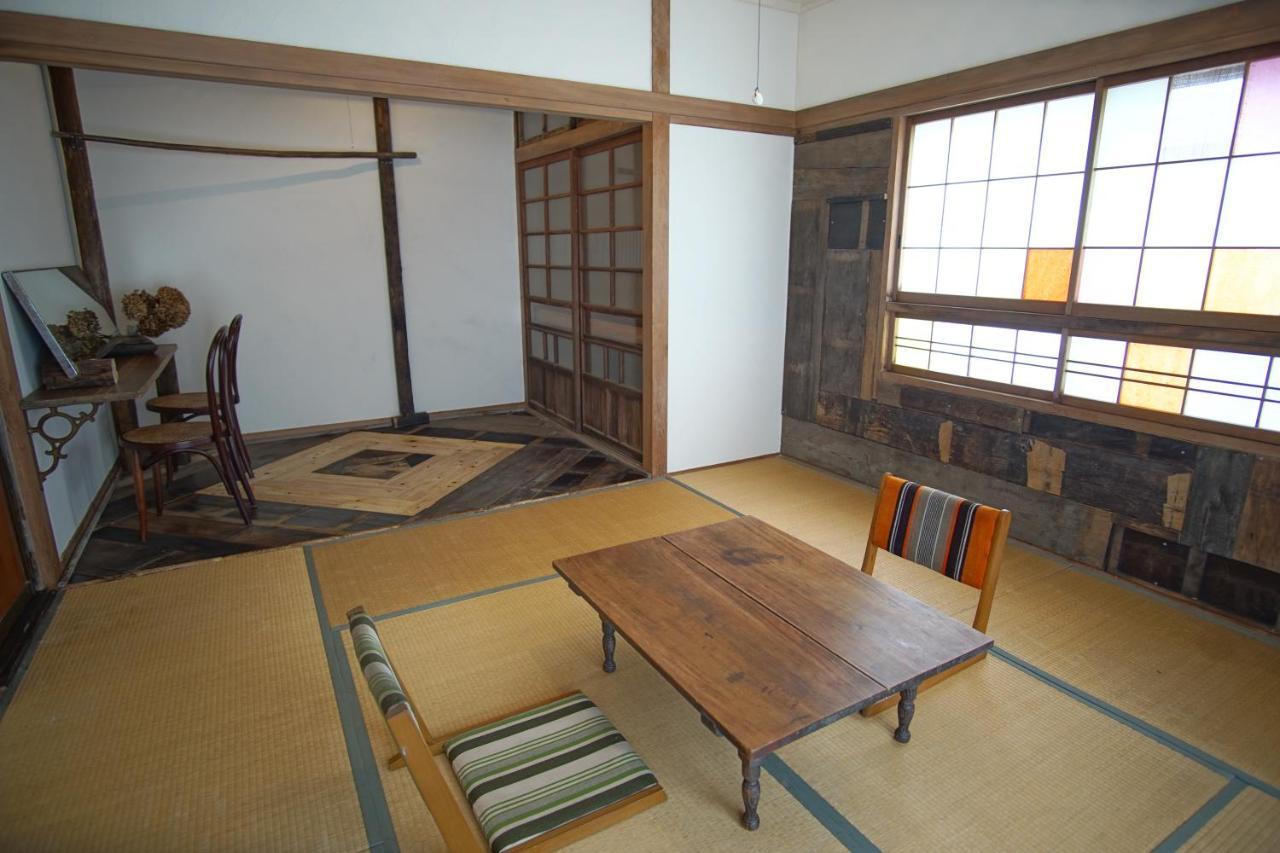 Hakuba Station Guesthouse En Exterior photo